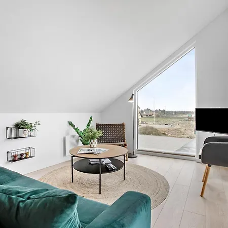 Kysthusene, Lejl 25 Apartman *